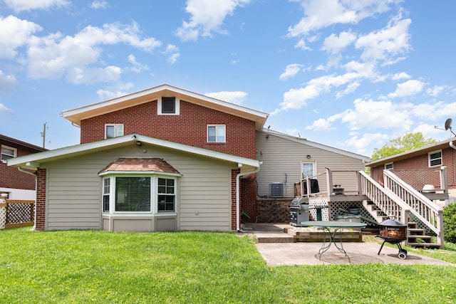 10 Juarez Cir, Covington, KY 41017 - back of house with a patio area, a yard, and brick siding