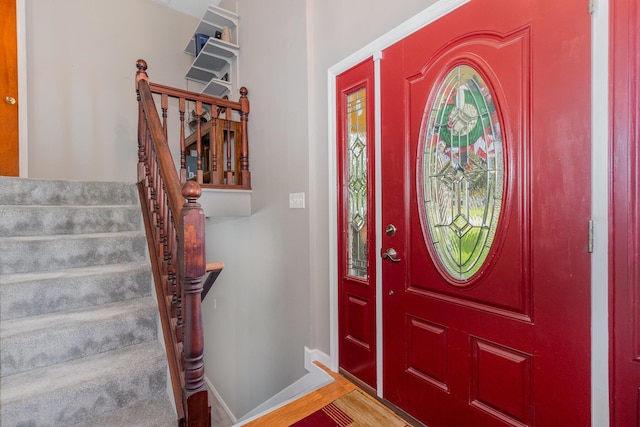 10 Juarez Cir, Covington, KY 41017 - foyer featuring stairs, baseboards, and wood finished floors