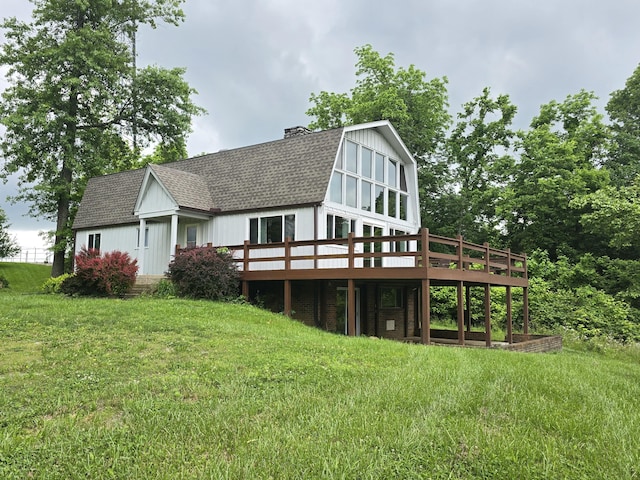 438 Ky Highway 455, Sparta, KY 41086 - rear view of house featuring a shingled roof, a wooden deck, a yard, and a chimney