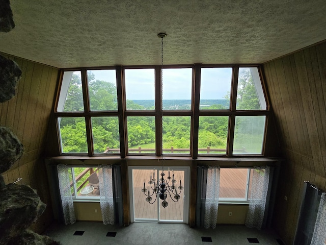 438 Ky Highway 455, Sparta, KY 41086 - unfurnished living room with wooden walls and a textured ceiling