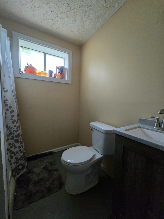 438 Ky Highway 455, Sparta, KY 41086 - bathroom with toilet, vanity, a textured ceiling, and a shower with curtain