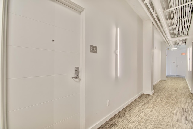 120 Main St Unit 205, Newport, KY 41071 - corridor featuring baseboards and light carpet