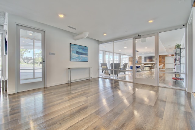 120 Main St Unit 205, Newport, KY 41071 - spare room featuring wood finished floors and recessed lighting