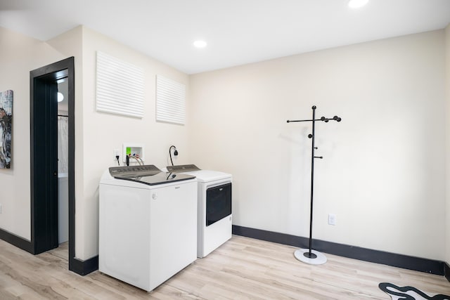 213 8th Ave, Dayton, KY 41074 - laundry area with washing machine and dryer, light wood finished floors, baseboards, and recessed lighting