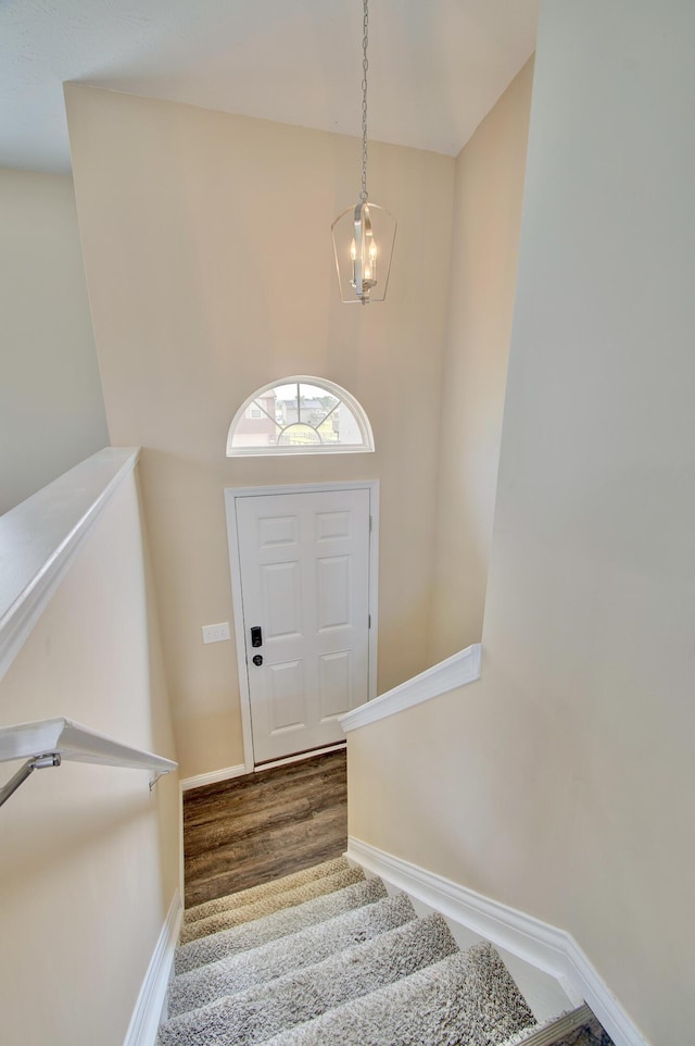 609 Crosswinds Pointe Ct, Walton, KY 41094 - entrance foyer featuring stairs, baseboards, wood finished floors, and a chandelier