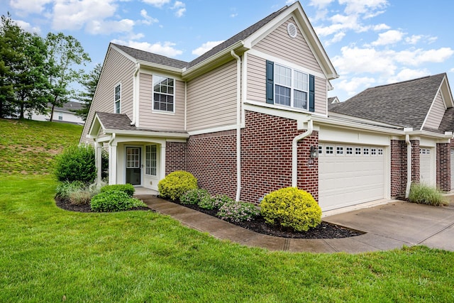874 Borderlands Dr, Erlanger, KY 41018 - view of home's exterior featuring driveway, a yard, a shingled roof, brick siding, and a garage