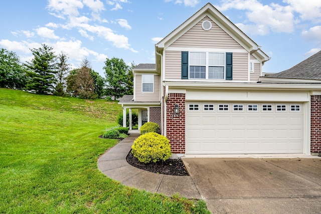 874 Borderlands Dr, Erlanger, KY 41018 - traditional-style home with brick siding, concrete driveway, roof with shingles, and a front yard
