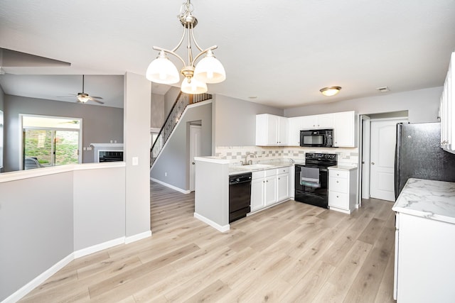 874 Borderlands Dr, Erlanger, KY 41018 - kitchen featuring black appliances, tasteful backsplash, white cabinets, and light wood-style floors