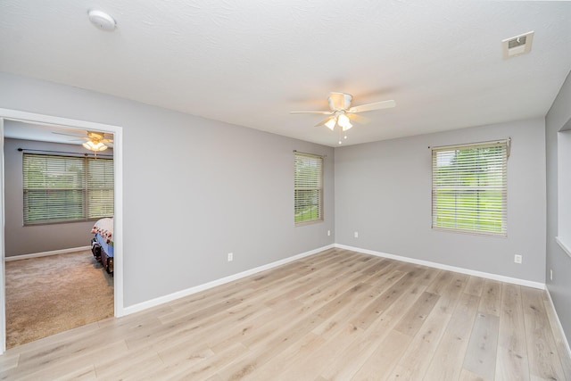 874 Borderlands Dr, Erlanger, KY 41018 - empty room featuring a ceiling fan, light wood-type flooring, baseboards, and a smoke detector