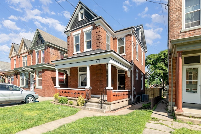 436 Elm St, Ludlow, KY 41016 - view of front facade with brick siding, covered porch, and central AC