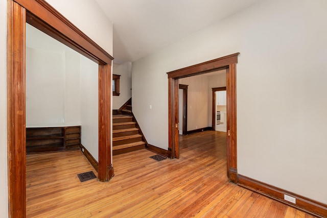 436 Elm St, Ludlow, KY 41016 - stairway featuring hardwood / wood-style floors and baseboards