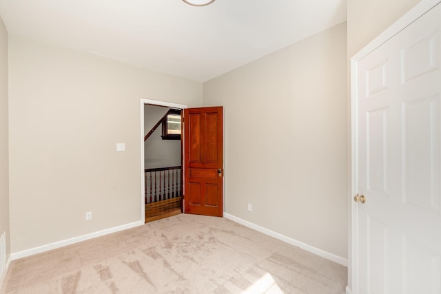 436 Elm St, Ludlow, KY 41016 - spare room with light carpet and baseboards