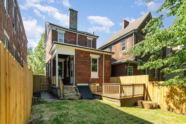 436 Elm St, Ludlow, KY 41016 - back of property featuring brick siding, a deck, and a chimney