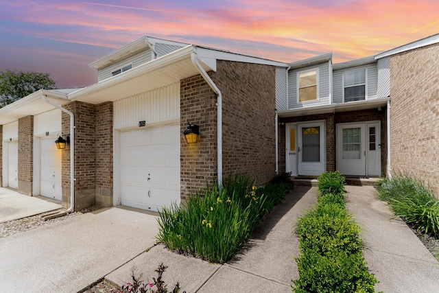 5332 Country Club Ln Unit 5C, Burlington, KY 41005 - view of front of home featuring an attached garage, driveway, and brick siding
