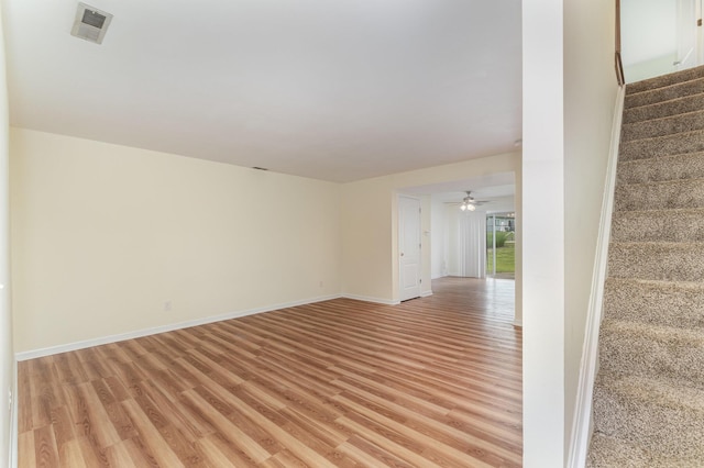 5332 Country Club Ln Unit 5C, Burlington, KY 41005 - unfurnished room featuring light wood finished floors, stairs, baseboards, and a ceiling fan