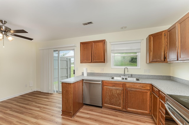 5332 Country Club Ln Unit 5C, Burlington, KY 41005 - kitchen with stainless steel dishwasher, a sink, a ceiling fan, brown cabinets, and light wood-type flooring