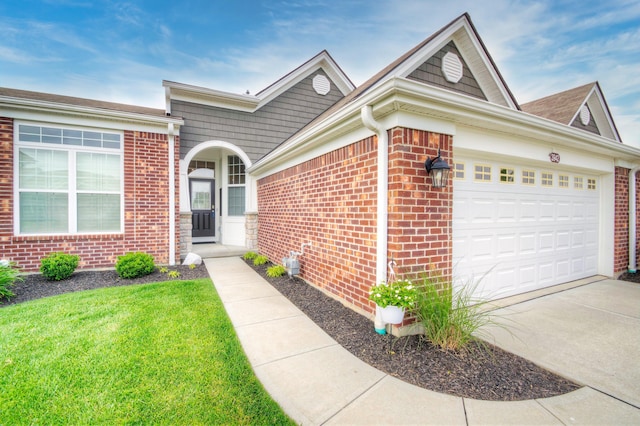 3942 Brunswick Ct, Erlanger, KY 41018 - view of front of home featuring brick siding, a garage, concrete driveway, and a front lawn
