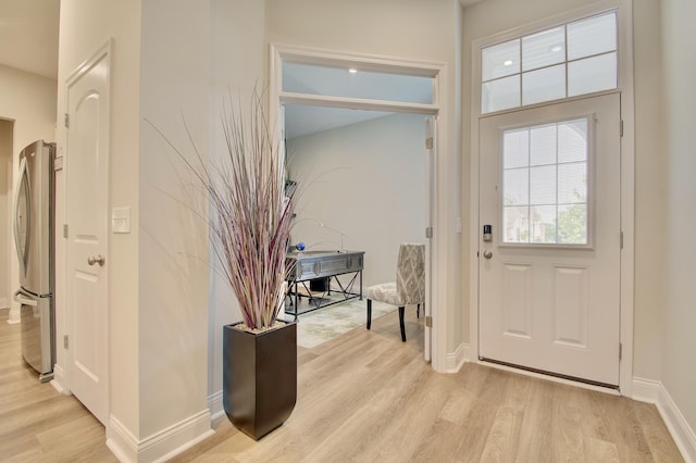 3942 Brunswick Ct, Erlanger, KY 41018 - entrance foyer with light wood-type flooring and baseboards