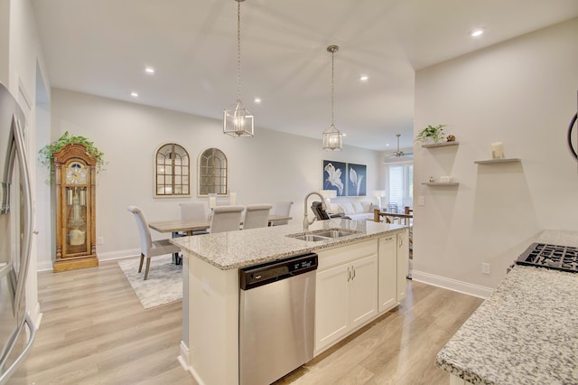3942 Brunswick Ct, Erlanger, KY 41018 - kitchen with stainless steel appliances, a sink, light wood-type flooring, recessed lighting, and white cabinets