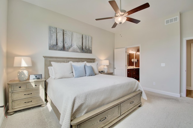 3942 Brunswick Ct, Erlanger, KY 41018 - bedroom with light carpet, baseboards, ensuite bathroom, and ceiling fan