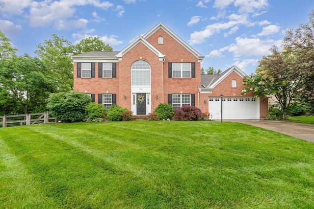 4049 Sherbourne Dr, Independence, KY 41051 - colonial-style house featuring brick siding, driveway, and an attached garage