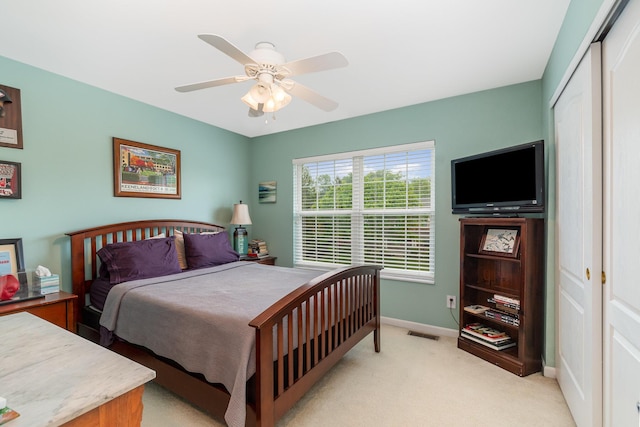 4049 Sherbourne Dr, Independence, KY 41051 - bedroom featuring light colored carpet, baseboards, a closet, and ceiling fan