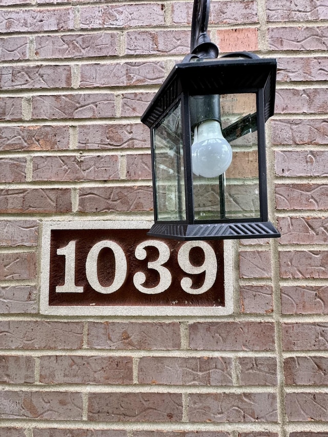 1039 Meadowbrook Ct, Hebron, KY 41048 - exterior view of brick siding and a wood stove