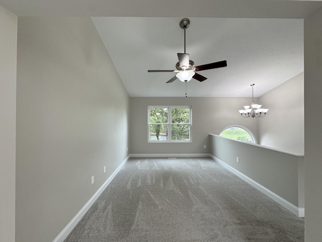 1039 Meadowbrook Ct, Hebron, KY 41048 - carpeted empty room with vaulted ceiling, ceiling fan, baseboards, and a chandelier