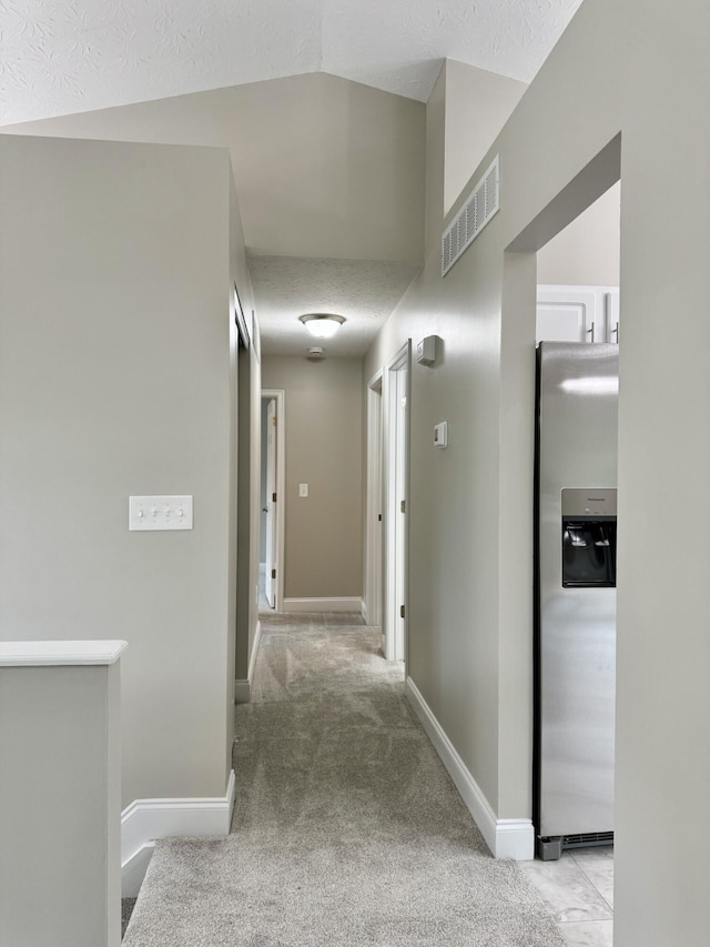 1039 Meadowbrook Ct, Hebron, KY 41048 - corridor with a textured ceiling, light colored carpet, and baseboards
