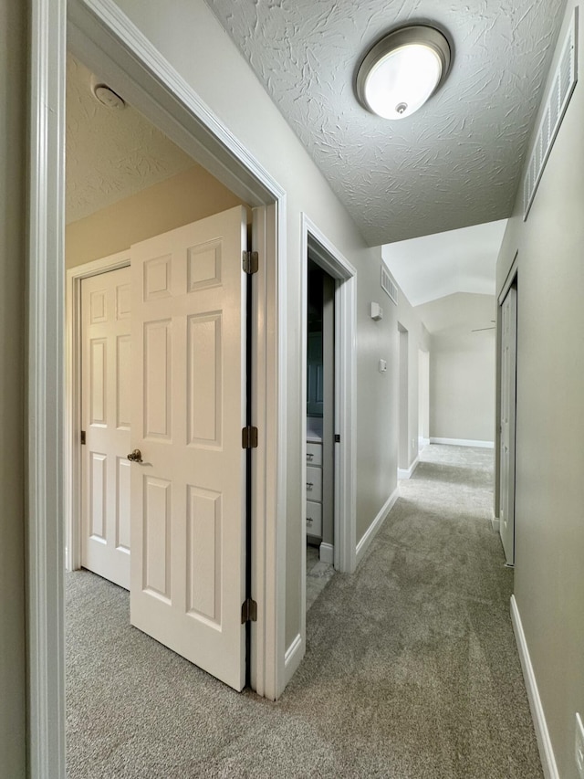1039 Meadowbrook Ct, Hebron, KY 41048 - hall with carpet floors, a textured ceiling, and baseboards