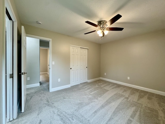 1039 Meadowbrook Ct, Hebron, KY 41048 - unfurnished bedroom with carpet flooring, baseboards, a closet, ceiling fan, and a textured ceiling
