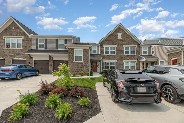 2535 Crosshill Dr, Crescent Springs, KY 41017 - townhome / multi-family property with driveway, brick siding, and a garage