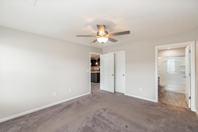 2535 Crosshill Dr, Crescent Springs, KY 41017 - unfurnished bedroom featuring baseboards, carpet floors, connected bathroom, and a ceiling fan