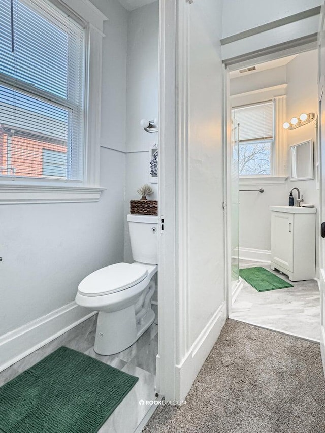 1816 Scott St, Covington, KY 41014 - bathroom with toilet, baseboards, and vanity