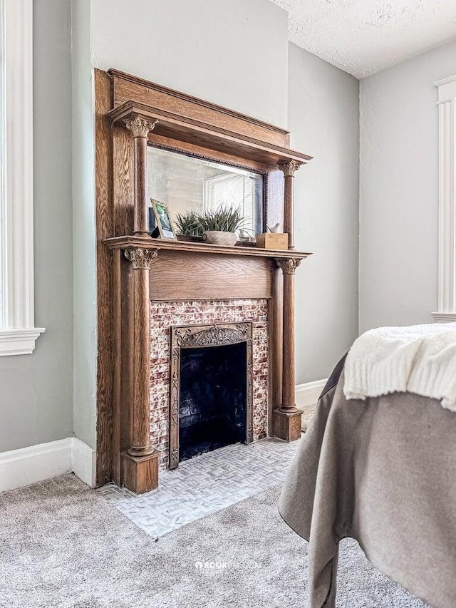 1816 Scott St, Covington, KY 41014 - bedroom with carpet flooring, a fireplace, a textured ceiling, and baseboards