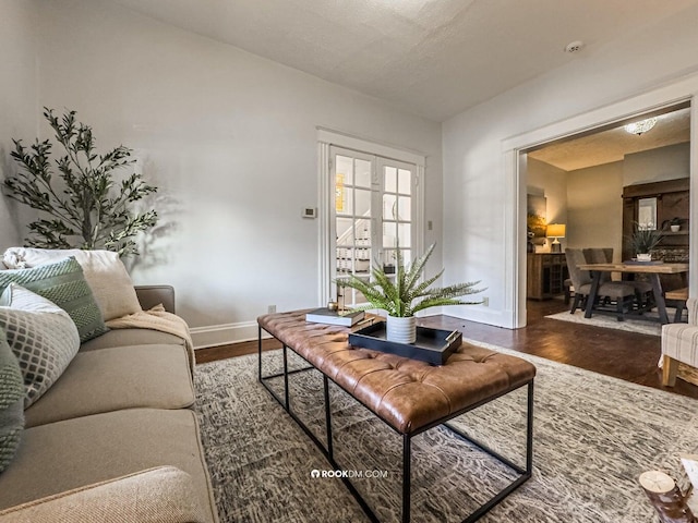 1816 Scott St, Covington, KY 41014 - living room featuring baseboards and wood finished floors
