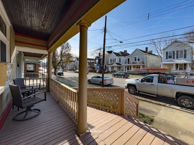 1816 Scott St, Covington, KY 41014 - wooden porch with a residential view