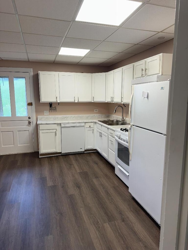 1148 Park Ave, Newport, KY 41071 - kitchen featuring white appliances, a sink, white cabinets, a drop ceiling, and light countertops