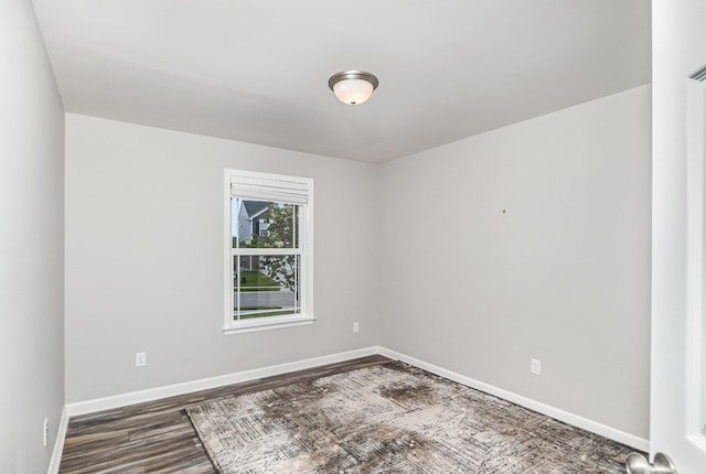 1739 Barons Cv, Hebron, KY 41048 - spare room featuring dark wood-type flooring and baseboards