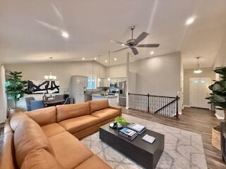 1739 Barons Cv, Hebron, KY 41048 - living room featuring ceiling fan, light wood-style flooring, recessed lighting, and a chandelier
