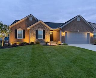1739 Barons Cv, Hebron, KY 41048 - ranch-style house with an attached garage, driveway, and a front yard