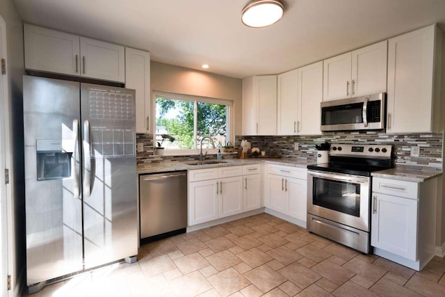 3416 Meadowlark Dr, Edgewood, KY 41018 - kitchen with stainless steel appliances, a sink, backsplash, white cabinets, and recessed lighting