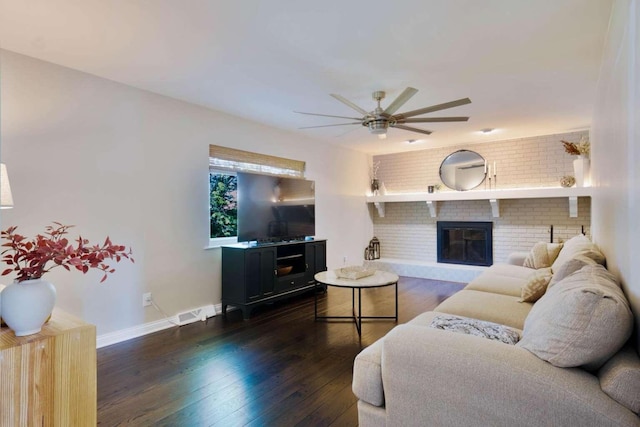 3416 Meadowlark Dr, Edgewood, KY 41018 - living room featuring ceiling fan, dark wood-type flooring, baseboards, and a brick fireplace