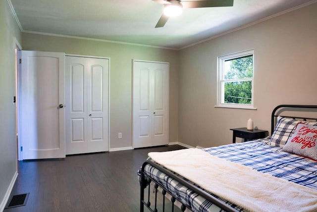 3416 Meadowlark Dr, Edgewood, KY 41018 - bedroom featuring multiple closets, dark wood-style floors, baseboards, a ceiling fan, and crown molding