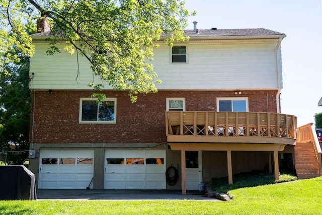 3416 Meadowlark Dr, Edgewood, KY 41018 - back of property featuring a garage, brick siding, a wooden deck, driveway, and a lawn