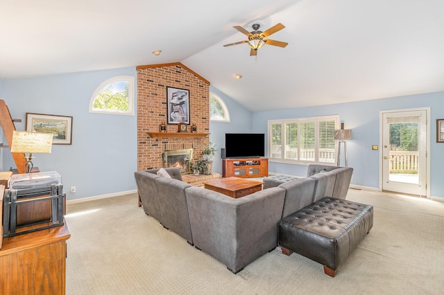 816 Winterberry Ct, Villa Hills, KY 41017 - carpeted living area featuring lofted ceiling, baseboards, a ceiling fan, a brick fireplace, and healthy amount of natural light