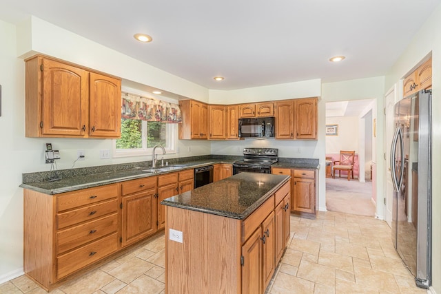 816 Winterberry Ct, Villa Hills, KY 41017 - kitchen with black appliances, a sink, dark stone countertops, a center island, and brown cabinetry