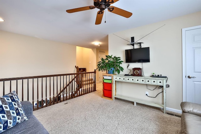3936 Eagleledge Ct, Independence, KY 41051 - living area with an upstairs landing, carpet flooring, and a ceiling fan