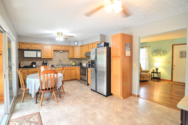 445 Elk Lk Lot 945/946, Owenton, KY 40359 - kitchen featuring stainless steel appliances, a ceiling fan, under cabinet range hood, a sink, and a textured ceiling