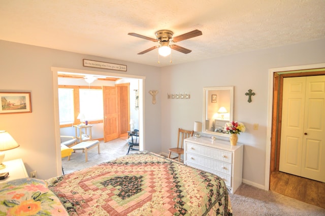 445 Elk Lk Lot 945/946, Owenton, KY 40359 - bedroom with baseboards, a textured ceiling, ceiling fan, and carpet flooring